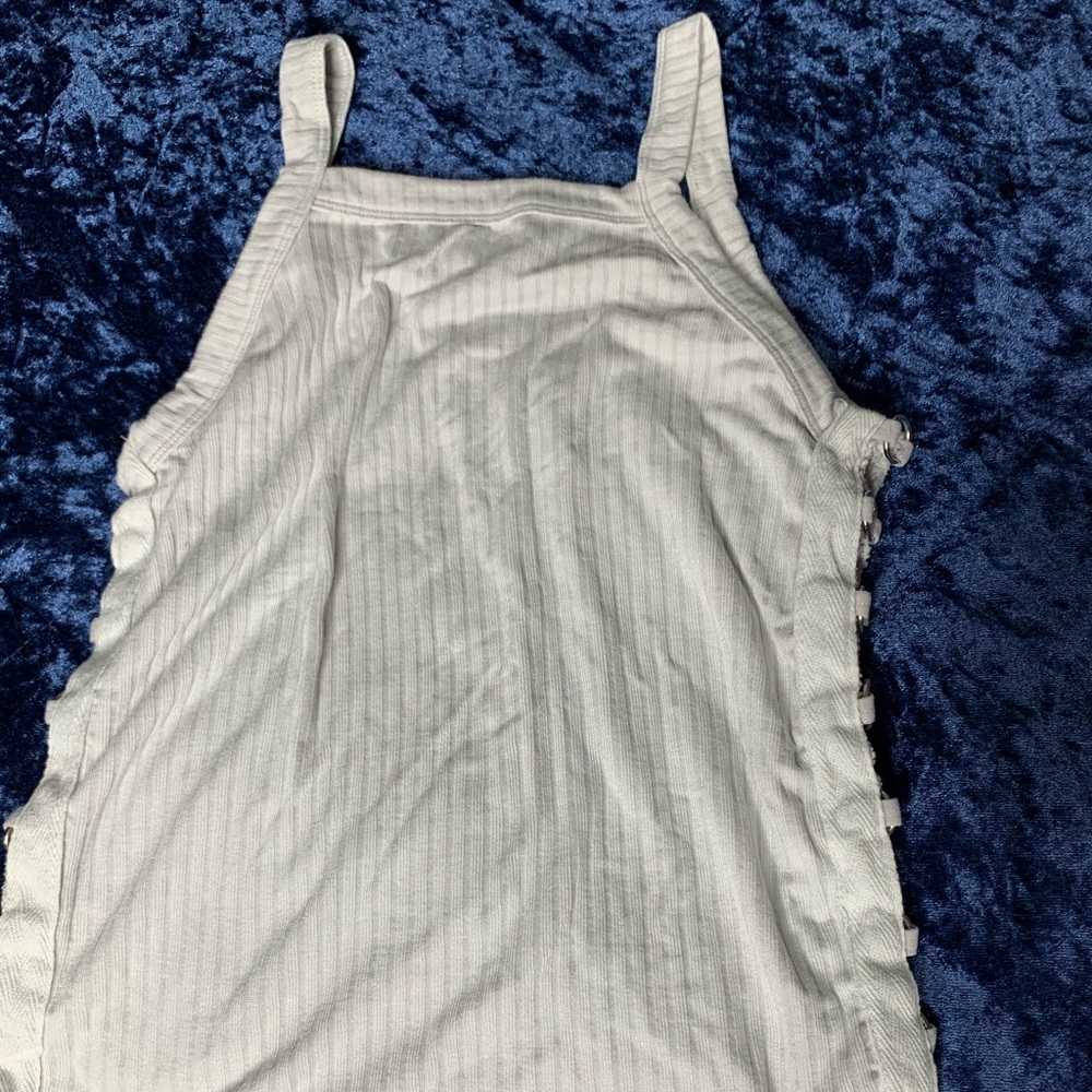 White ribbed tank top w/ cut outs
